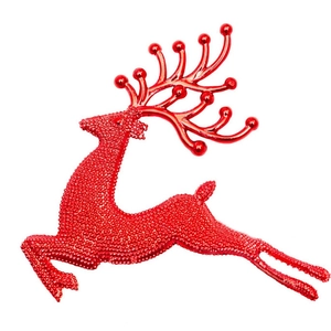 Sparkling red Christmas reindeer ornament in jumping pose for holiday tree decoration