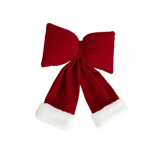 Large burgundy velvet Christmas bow with white faux fur trim for holiday decoration