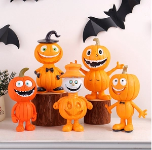 Detailed view of five unique resin pumpkin figurines with wizard hats for Halloween decor