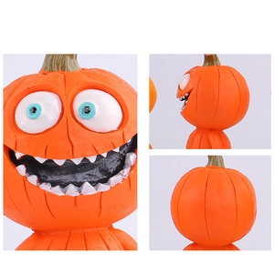 Detail view showing different angles of Halloween pumpkin doll with wide grin and large eyes