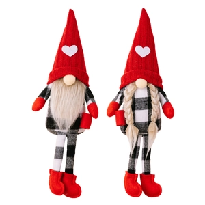 Pair of Christmas long-legged gnomes with red heart knitted hats and buffalo plaid patterns