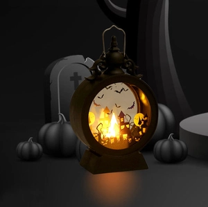 Halloween decorative LED lantern with spooky castle silhouette and warm flickering candle light