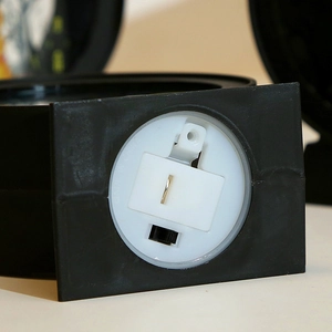 Detail view of the Halloween LED lantern base with power switch and battery compartment