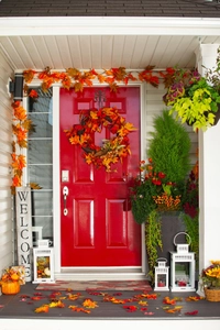 Autumn porch decor set with maple leaf garland, welcome sign and vintage lanterns