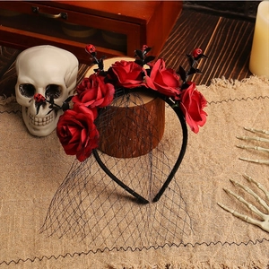 Halloween headband with red roses, black mesh veil and small skull accents for parties
