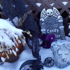 Gothic Halloween outdoor set with spooky tombstone, black torn cloth and skulls