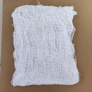 Close-up of white woven mesh netting with a fine multi-strand durable structure