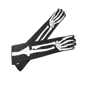 Detailed close-up of long black Halloween gloves with white bone skeleton print