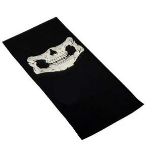 Close-up of black seamless tubular neck gaiter with white skull jaw print on white background