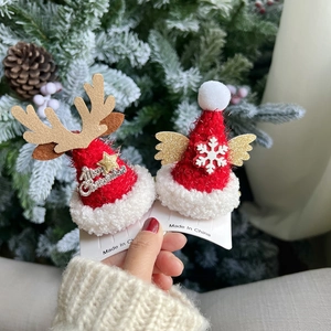 Barrettes de Noël festives avec bois de renne dorés et mini bonnet de Père Noël