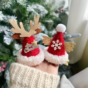 Barrettes de Noël faites main avec bois de renne en peluche et ailes de neige blanches
