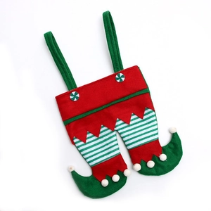 Christmas elf pants gift bag with peppermint buttons and fuzzy pompoms for holiday parties