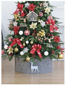 Detail of grey felt Christmas tree collar featuring white reindeer silhouette decor