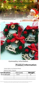 Detail of 6cm Christmas wreath with red bow, golden bell and Merry Christmas sign