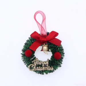 6cm mini Christmas wreath with red bow, gold bells, and Merry Christmas sign on white background