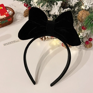 Serre-tête élégant à nœud en velours pour Noël avec décorations festives et étoiles