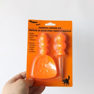 Halloween pumpkin carving kit with orange handles, scoop, and four stencils