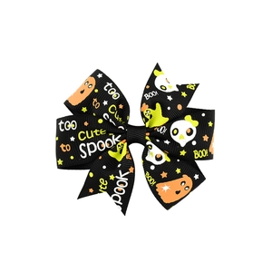 Barrette nœud d'Halloween avec motifs citrouilles et fantômes sur ruban noir