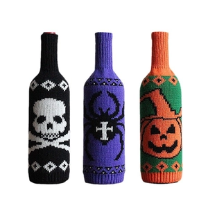 Halloween knitted wine bottle covers with skull spider and pumpkin festive patterns