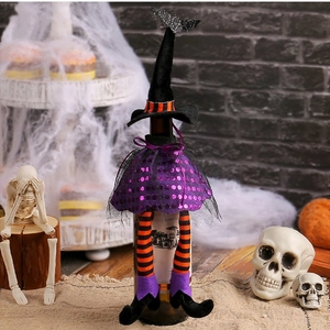 Halloween witch hat and purple sequin skirt wine bottle cover for spooky table decor