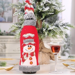 Red Christmas wine bottle cover with snowman embroidery and matching knit mini hat decor