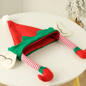 Cute Christmas elf hat with striped legs and bells, festive holiday party decoration
