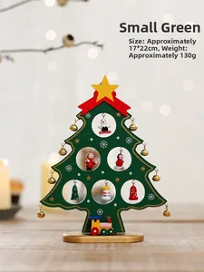 Green wooden Christmas tree with miniature ornaments, bells, and train, 17x22cm 130g