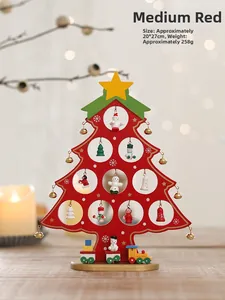 Detail of red wooden Christmas tree with miniature ornaments and a small train base
