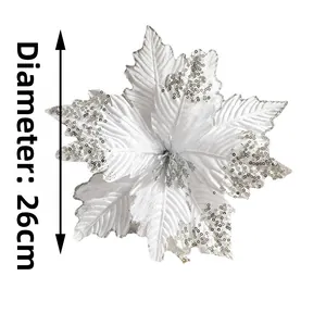 Macro shot of 26cm white artificial Christmas flower with silver sequins and detailed petals