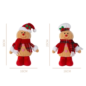 Detail of Christmas gingerbread plush figures showing 30cm and 25cm height dimensions