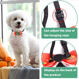 Detail of Christmas plaid pet bowtie with adjustable elastic strap and buckle on a dog
