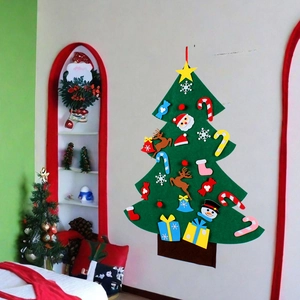 Detail of DIY felt Christmas tree set with colorful velcro ornaments for children wall decor