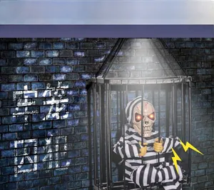 Halloween electric cage prisoner with red glowing eyes and striped uniform on dark wall