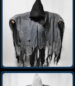 Detail von zerlumptem Halloween-Kapuzenumhang mit Netzgewebe und realistischen Löchern