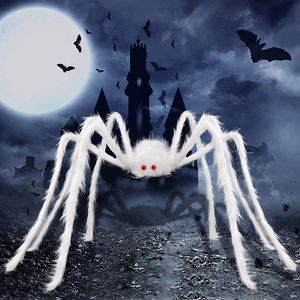 Giant white plush Halloween spider with red eyes and poseable legs in a spooky scene