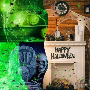 Halloween-Deko-Set mit schwarzen und im Dunkeln leuchtenden Spinnen und Spinnenweben