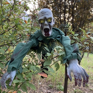 Creepy crawling zombie prop with realistic head and bloody hands for Halloween yard decor