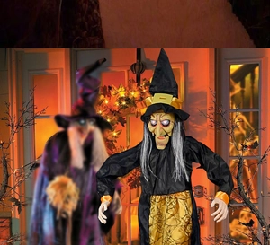 Détail d'une sorcière d'Halloween suspendue avec yeux lumineux et décor de toile d'araignée