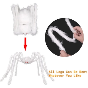 Detail showing flexible bendable legs of the white furry Halloween spider decoration