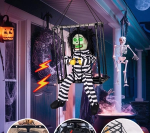 Macro detail of Halloween prisoner cage toy showing battery box and hanging hook structure