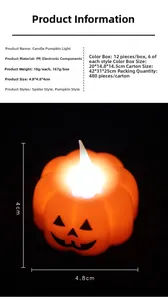 Macro detail of Halloween LED pumpkin candle light with black face print and warm glow