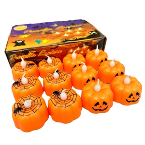 12-pack Halloween LED pumpkin candle lights with spider web and jack-o-lantern patterns