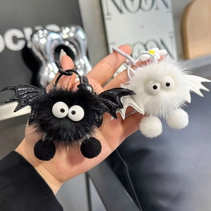 Cute plush mink fur bat keychains in black and white colors with wings and big eyes