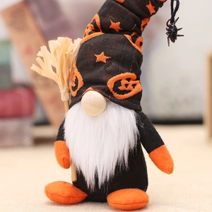 Halloween gnome with orange spider hat holding broom for festive home decoration