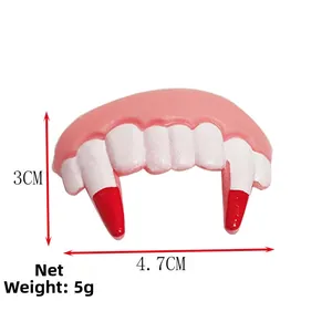 Funny Halloween pet dentures toy with white teeth and red fangs, sized 4.7cm x 3cm