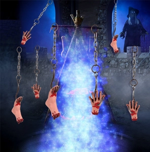 Close-up of realistic Halloween bloody severed hands and feet hanging on metal chains