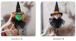 Detailed comparison of two Halloween witch hanging dolls with mesh skirts and lace collars