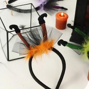 Halloween witch leg headbands with orange green and purple stripes and feathers for party decor