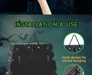 Rear view of Halloween spider doorbell showing battery compartment and mounting hook