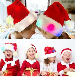 Close-up of children wearing plush LED Christmas hats with colorful glowing lights
